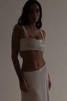 white sequin midi skirt and matching top
