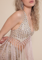 Boho inspired macrame fringe halter top and matching mirror sequin pants.